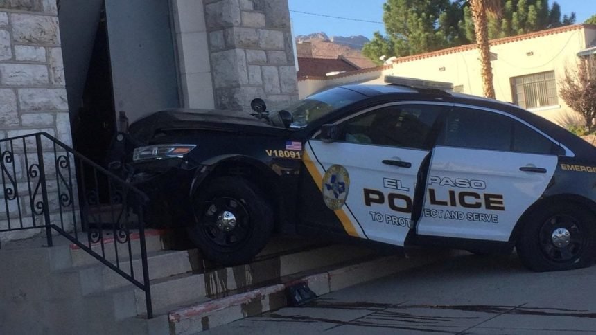 Police car crashes into church