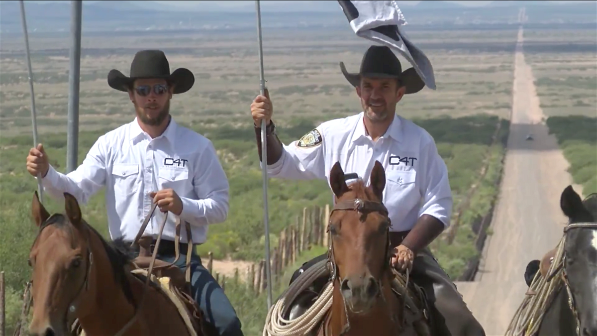 Couy Griffin (right) is an Otero County Commissioner who founded the group Cowboys for Trump.