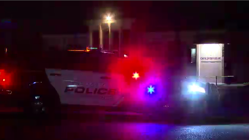 A police car on scene of a pedestrian struck on Saturday night.