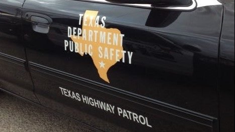The Texas Dept. of Public Safety logo is seen on the door of a patrol vehicle.