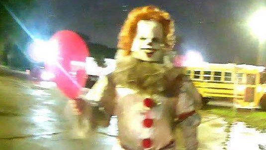 A Conyers Police officer's body cam captured this photo of a man dressed in a clown suit and holding a balloon.