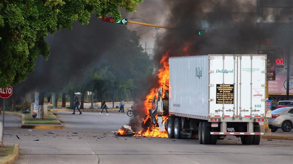 A truck burns in a Culiacan street after a gun battle between drug cartel members and Mexican authorities recently.