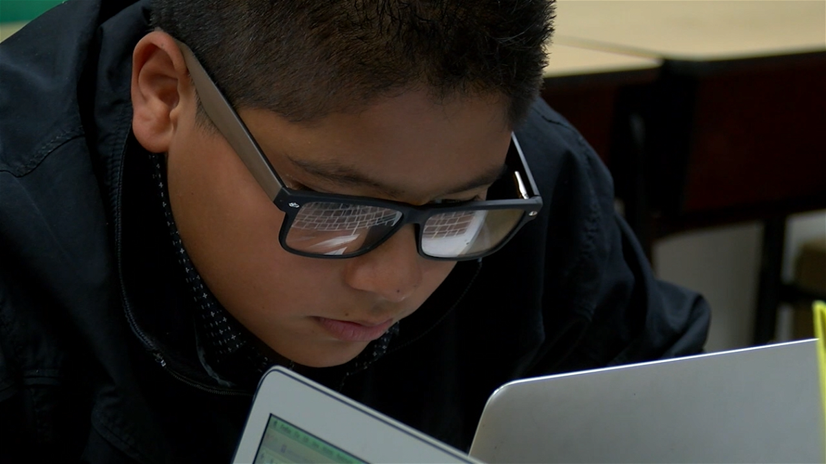A Las Cruces Public Schools student using a computer.