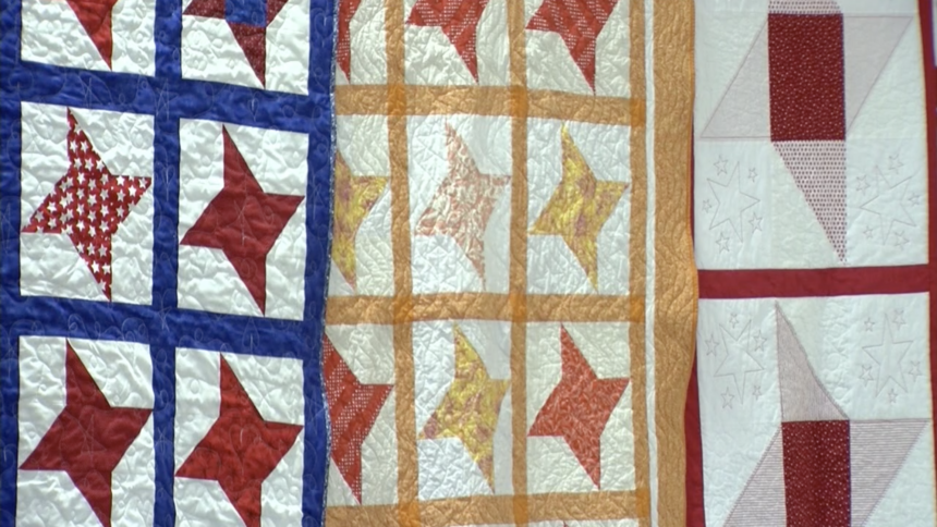 Quilting guild donates quilts to Aug. 3 victims
