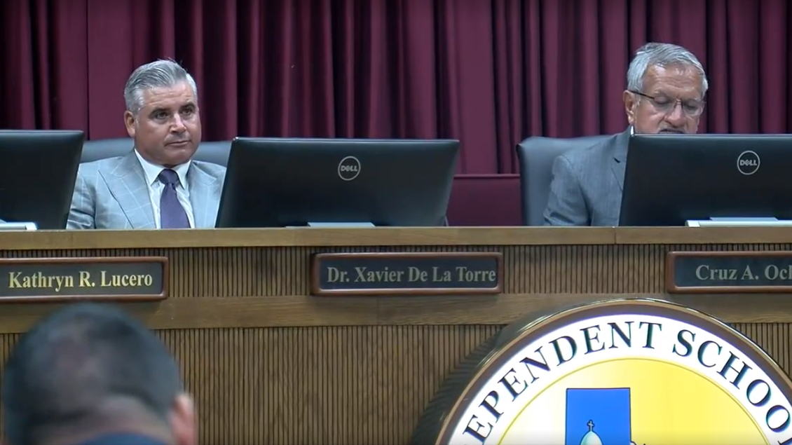 YISD superintendent Xavier De La Torre (left) at a school board meeting.