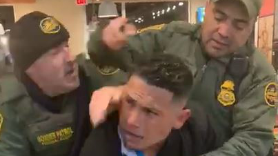 Border Patrol agents use a taser on a man suspected to human smuggling.