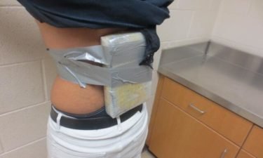 drugs taped to smuggler's back
