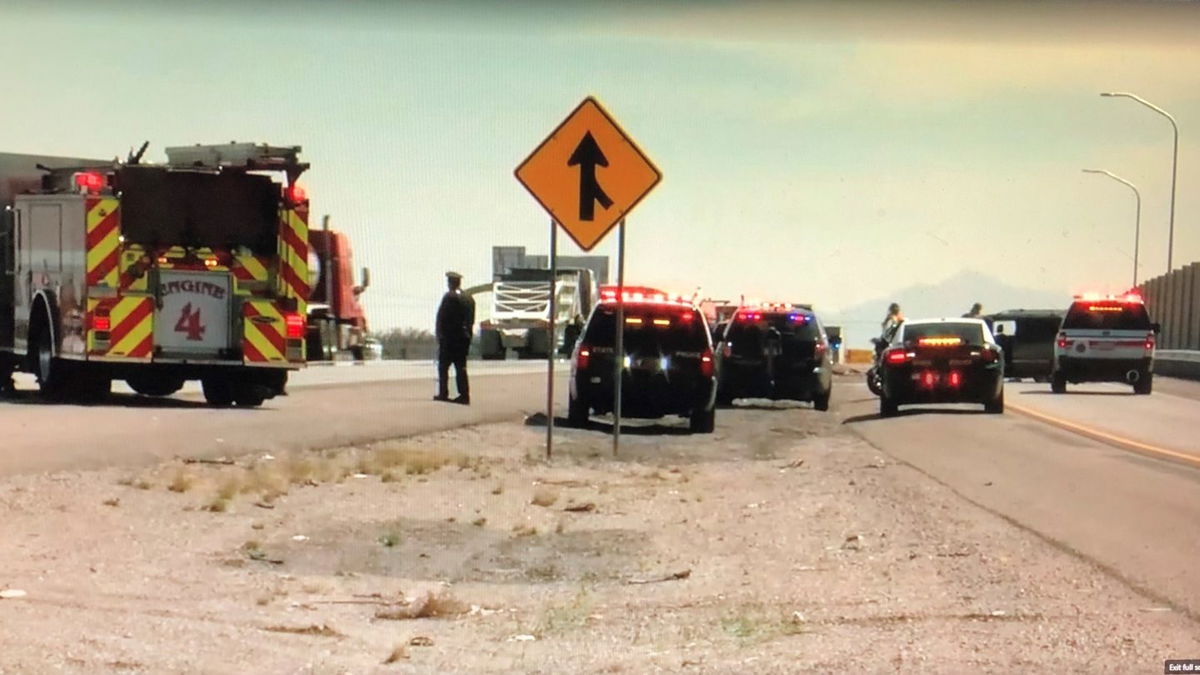 Police and fire crews at the scene of a crash at the I-25 and I-10 interchange.