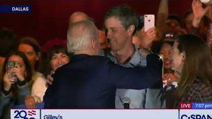 Joe Biden hugs Beto O'Rourke at a campaign rally in Dallas.