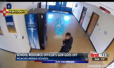 gun-discharges-school-office