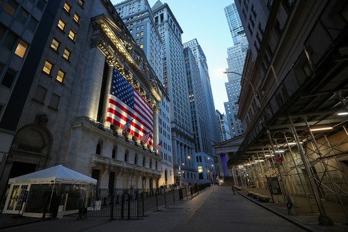 An outside view of the New York Stock Exchange along Wall Street in New York.