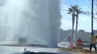 broken water main spews