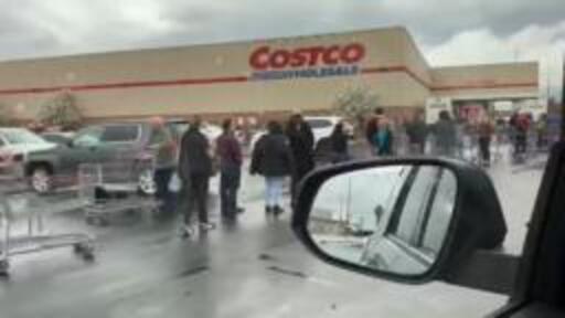 Shoppers lined up into the parking lot in east El Paso at Costco.