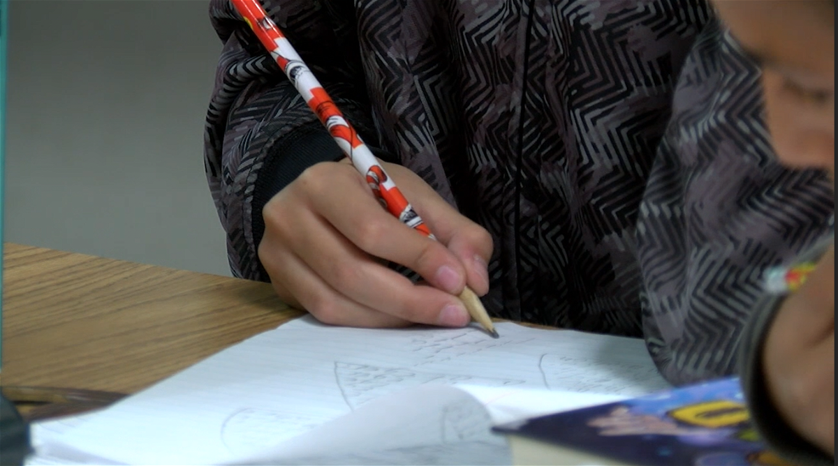 A New Mexico student works on an assignment.