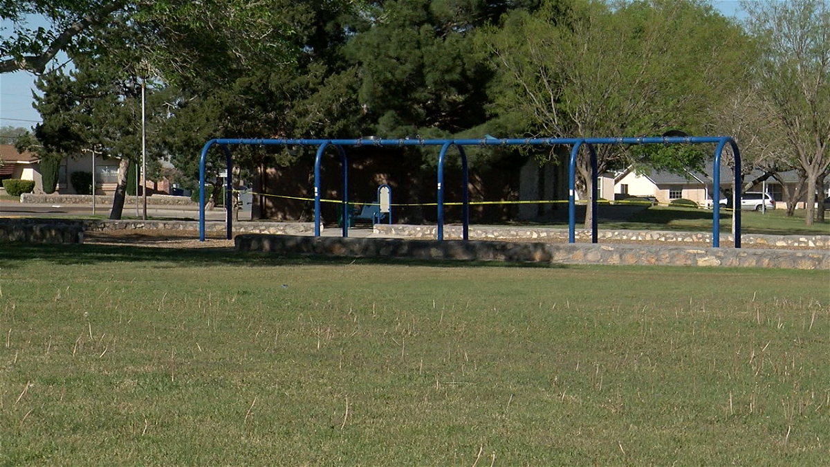 Playground equipment at Arlington Park in El Paso is taped off as part of the park's closure.