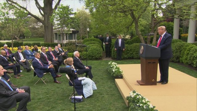 President Trump conducts a virus briefing on the White House lawn.