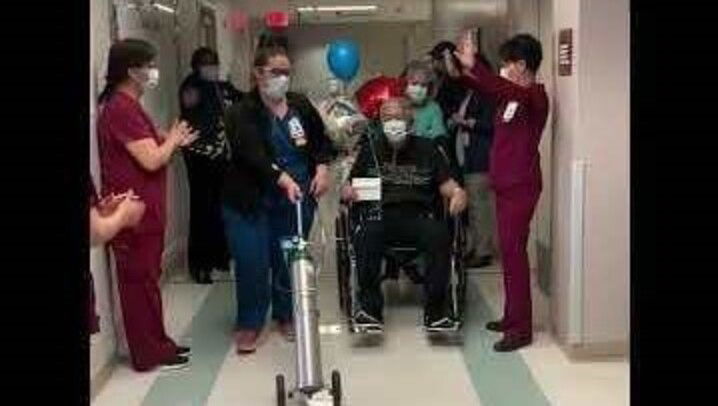 70-year-old recoevred coronavirus patient is cheered as he leaves Del Sol hospital in El Paso.