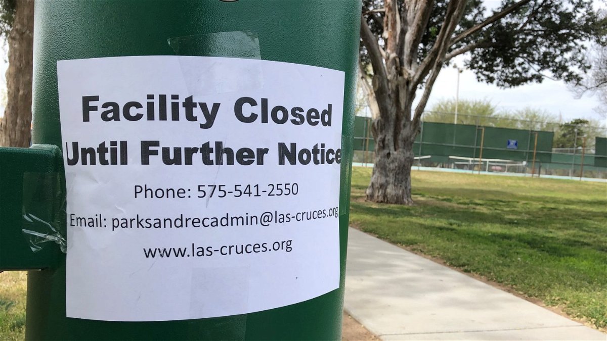 A sign posted at a Las Cruces city park indicating it's closure until further notice.