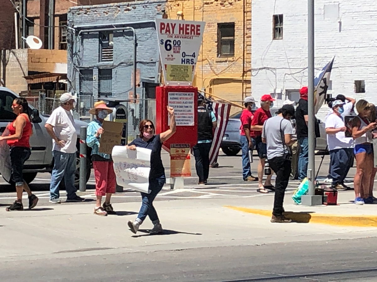 Protesters in downtown El Paso demonstrate in a push to reopen the Texas economy.