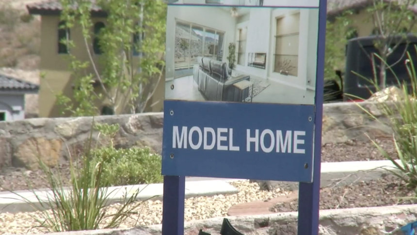A model home is shown in a new housing subdivision. 