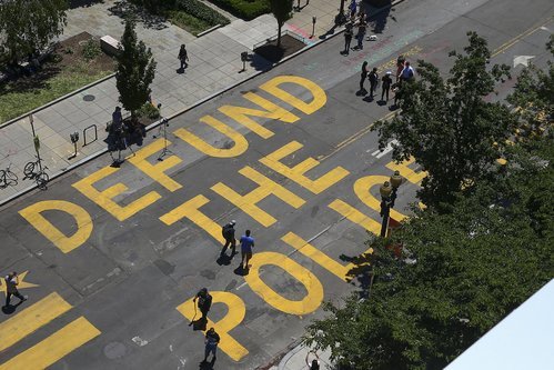 'Defund The Police' is painted on a city street in the nation's capital.