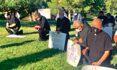 bishop takes a knee