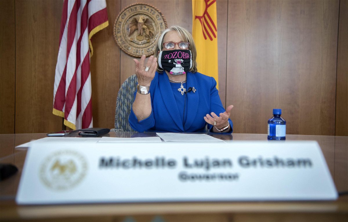 New Mexico Gov. Michelle Lujan Grisham wears a mask at a recent briefing.