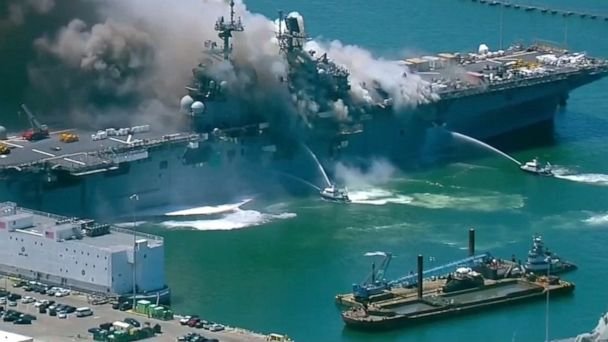Smoke rises from a Navy ship fire in San Diego.