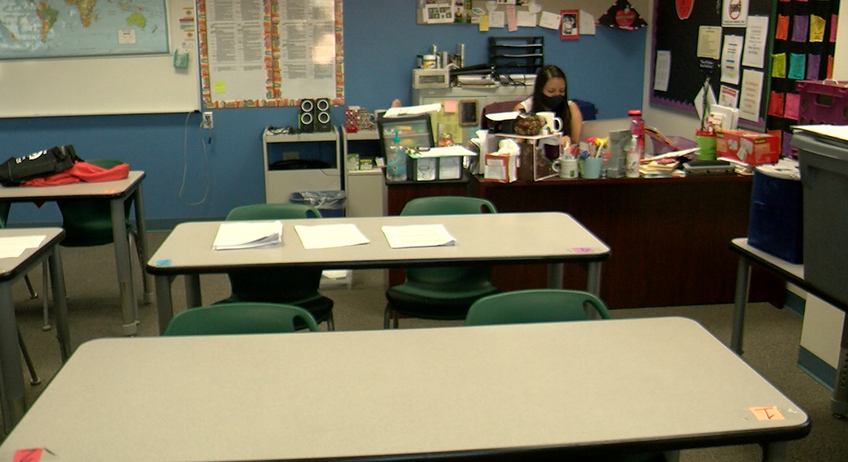 A teacher leads Virtual learning from her empty classroom at New America charter school in Las Cruces.