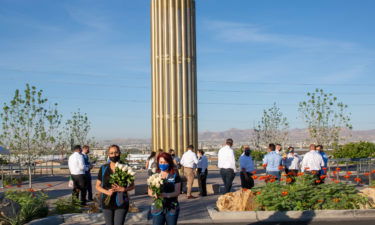 grand-candella-walmart-associates-holding-flowers