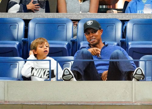 Tiger Woods and  his son.