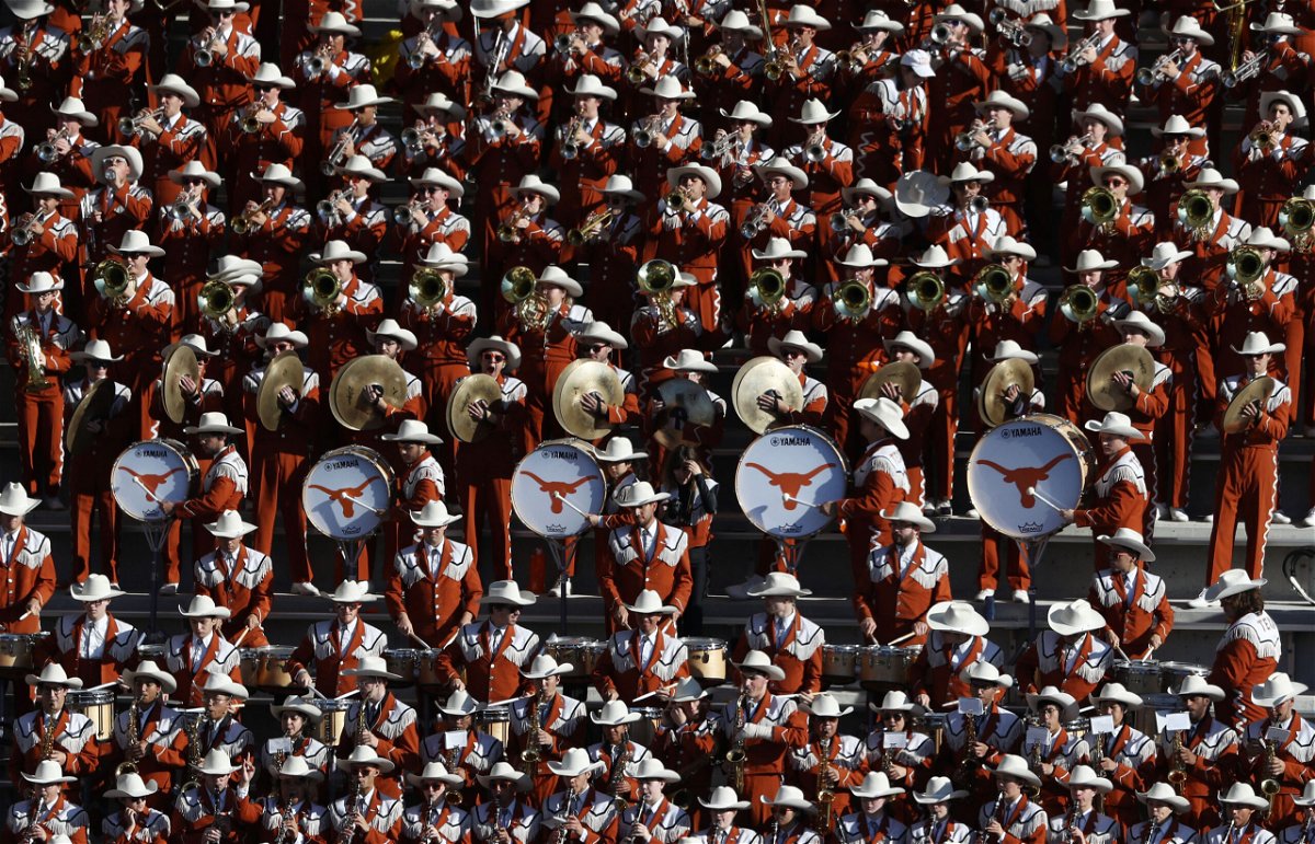 The University of Texas Longhorns band performs during a football game at McLane Stadium in 2019.