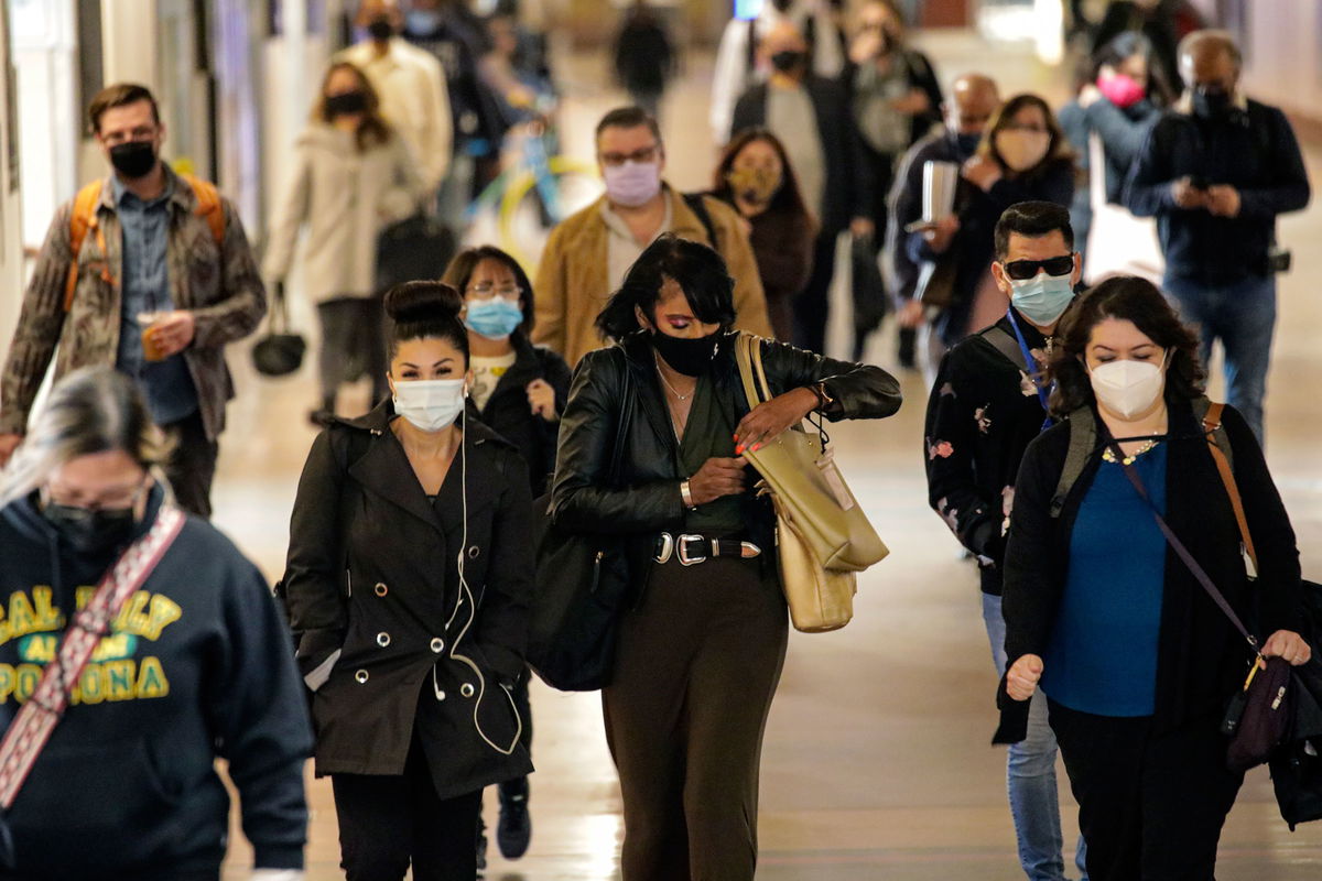 Commuters in face coverings at Union Station in Los Angeles, California.