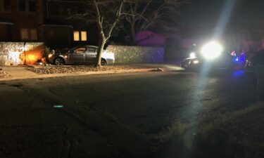 car hits rock wall