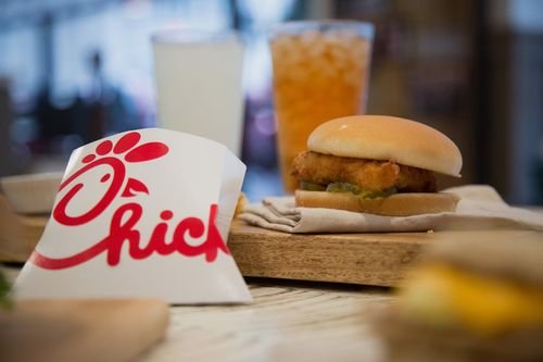 A Chick-fil-a meal sits on a table.