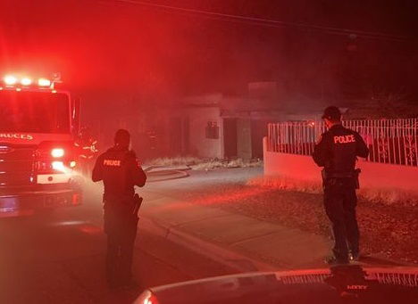 Fire and police at the scene of an abandoned house fire in Las Cruces.