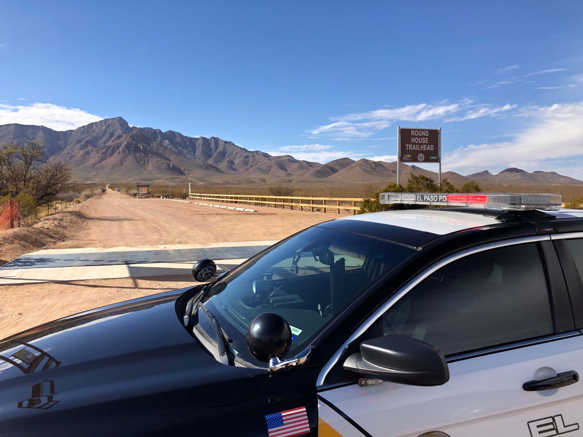 Police at the scene of  a possible explosive device found along the Lazy Cow Trail in  the Franklin Mountains.