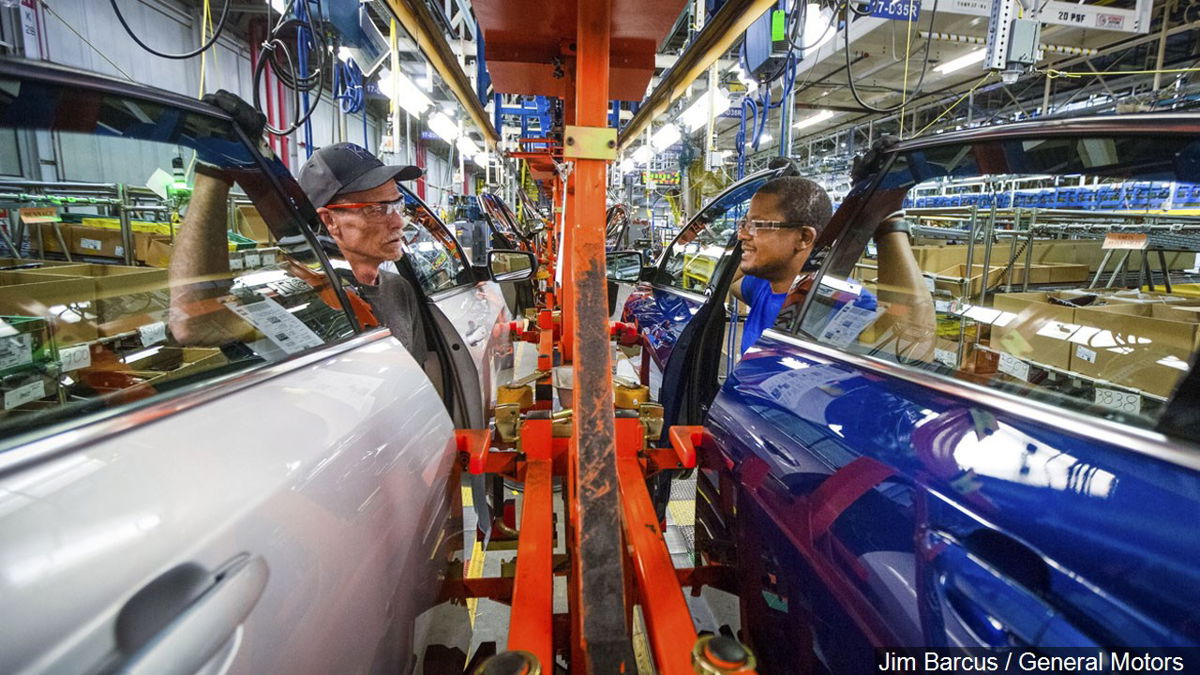 Employees work on the assembly line at the GM Fairfax Assembly & Stamping Plant.