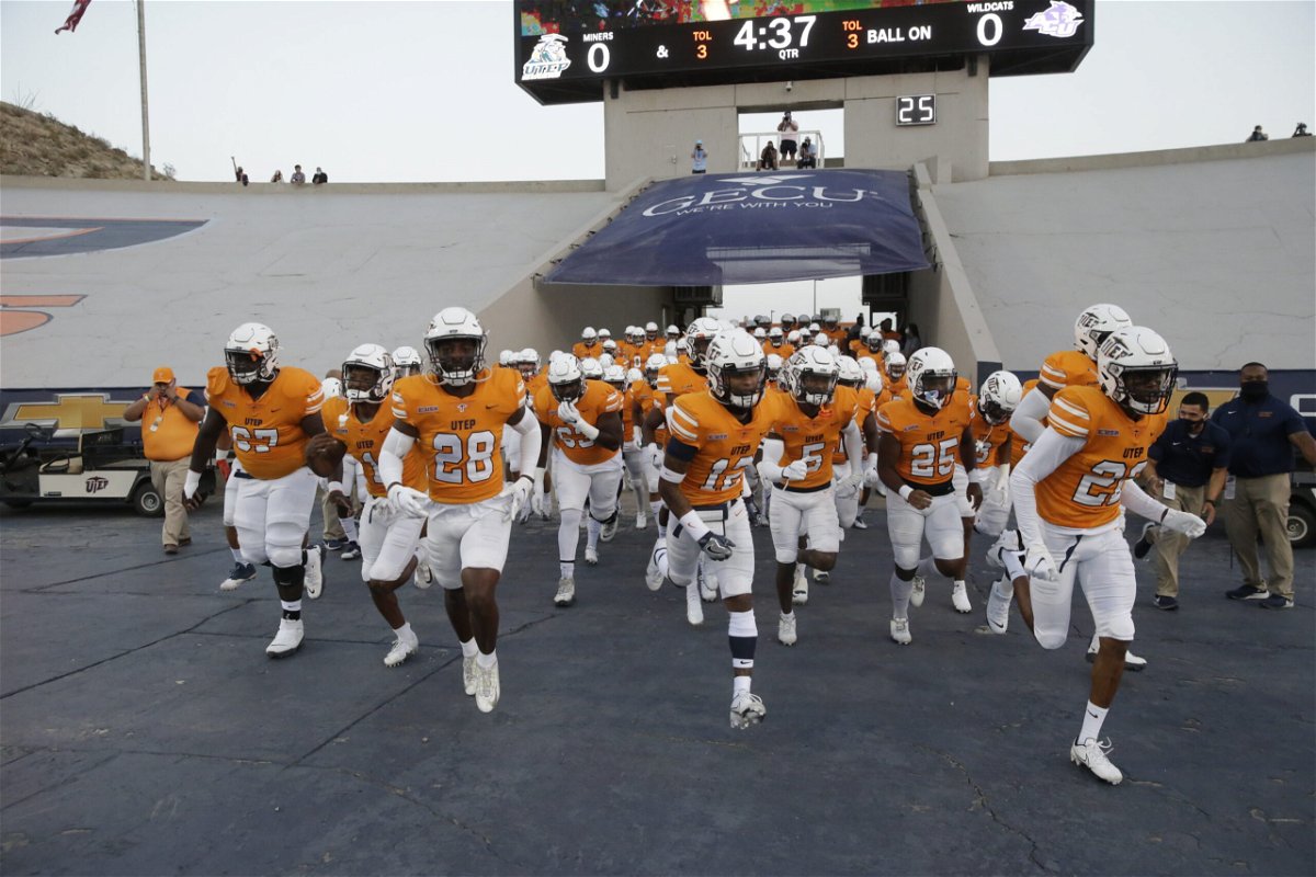 The UTEP Miners football team takes the field for a game at the Sun Bowl.