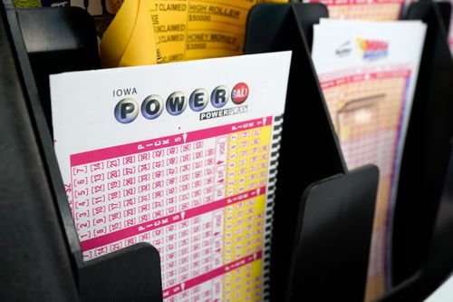 A Powerball ticket sales display is seen inside a store.