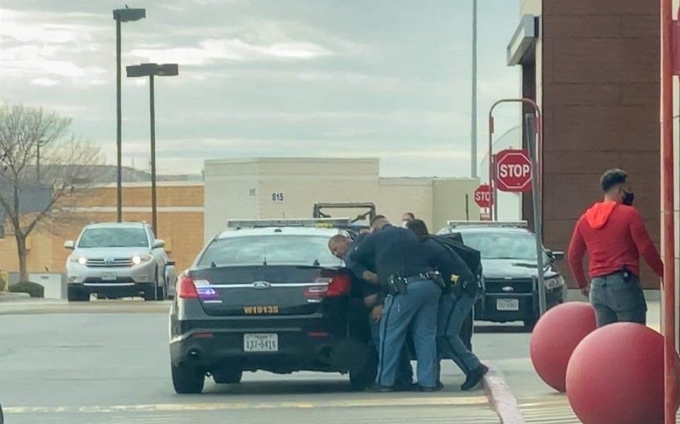 El Paso police arrest a struggling man at the Target store on Sunland Park.