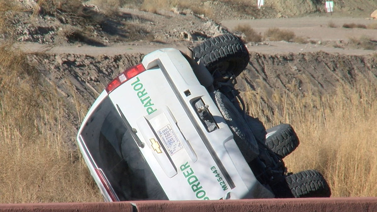 A Border Patrol SUV that rolled over.