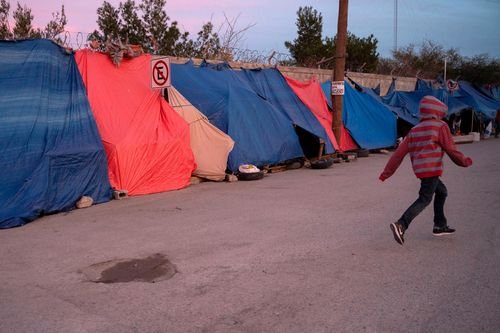 Asylum seekers in a tent encampment in Ciudad Juárez.