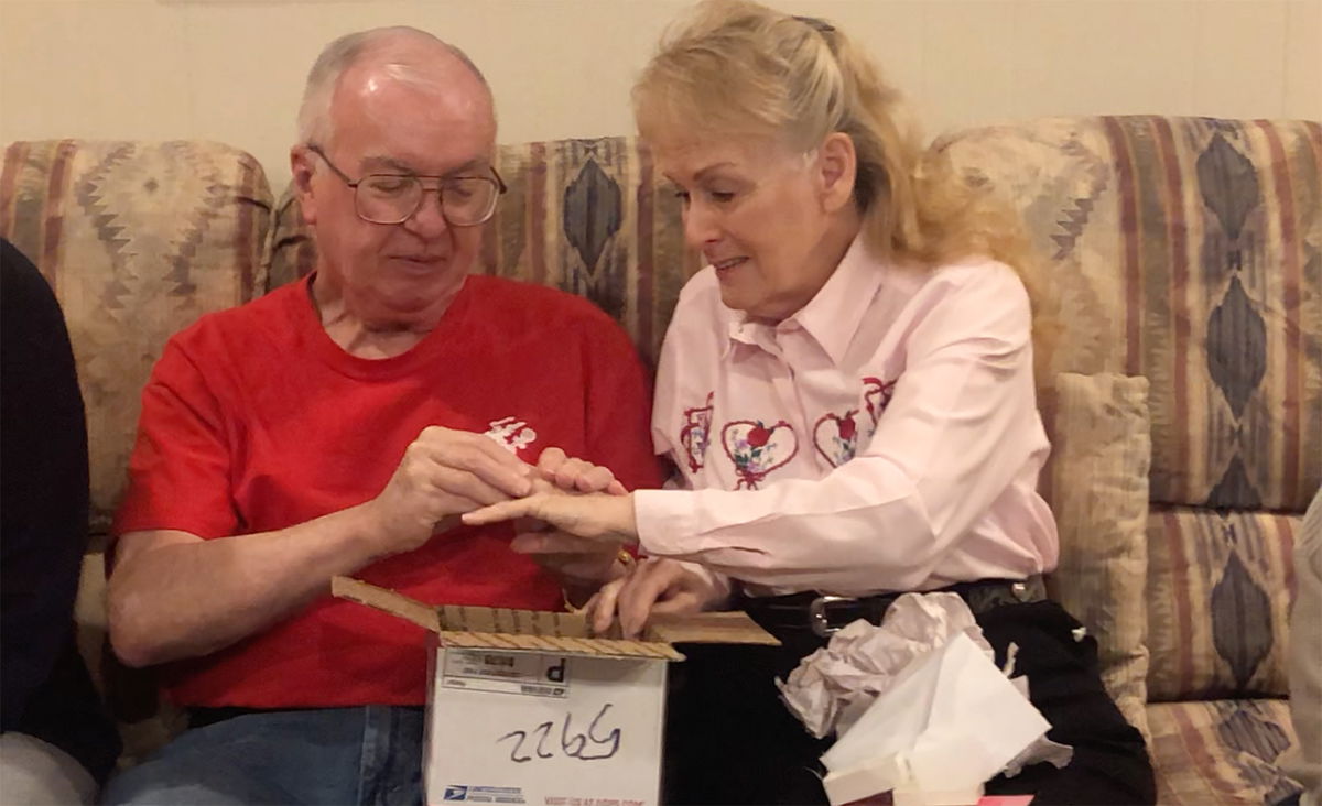 Robert and Karen Autenrieth on Valentine's Day with the wedding ring that went missing 50 years ago.