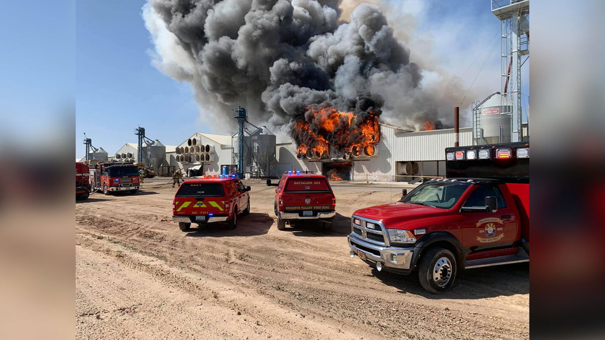 Crews battle a second alarm fire at Hickman Family Farms in Arlington, Arizona.