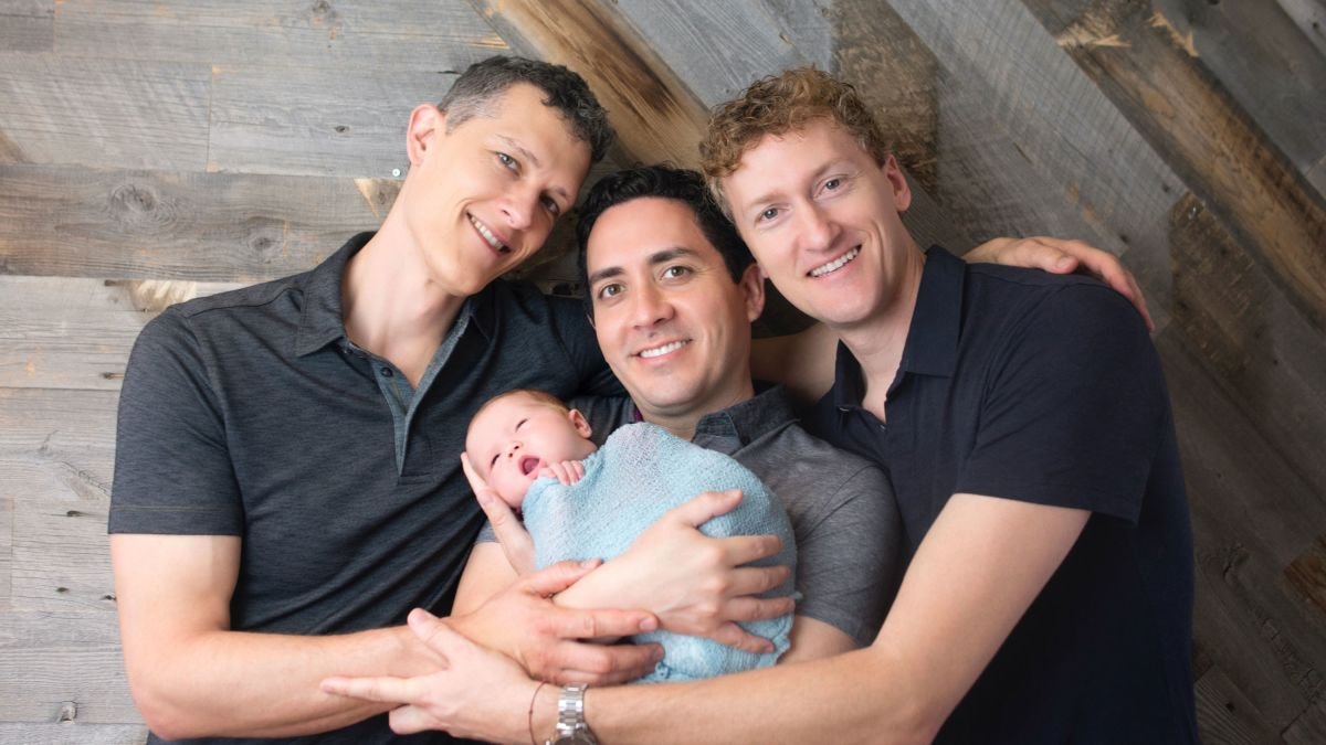 Ian Jenkins and his partners, Alan and Jeremy, and their baby.