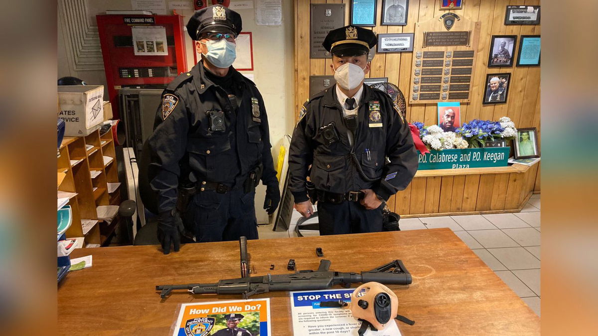 New York police show  an AK-47 confiscated from a teen at a Times Square subway station.