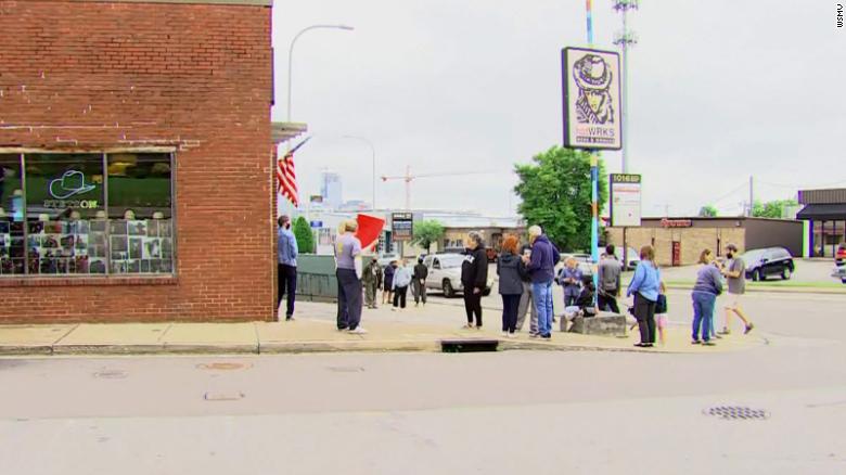 Demonstrators gather outside a Nashville hat store that offered 