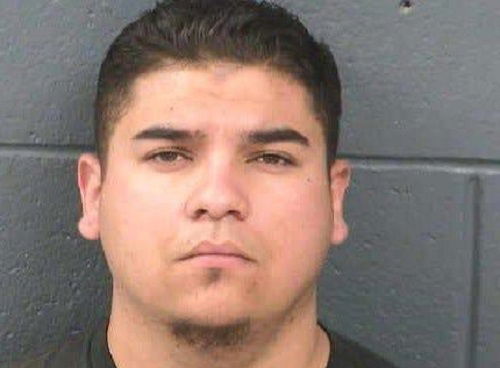 Israel Ramirez, charged with child abuse.