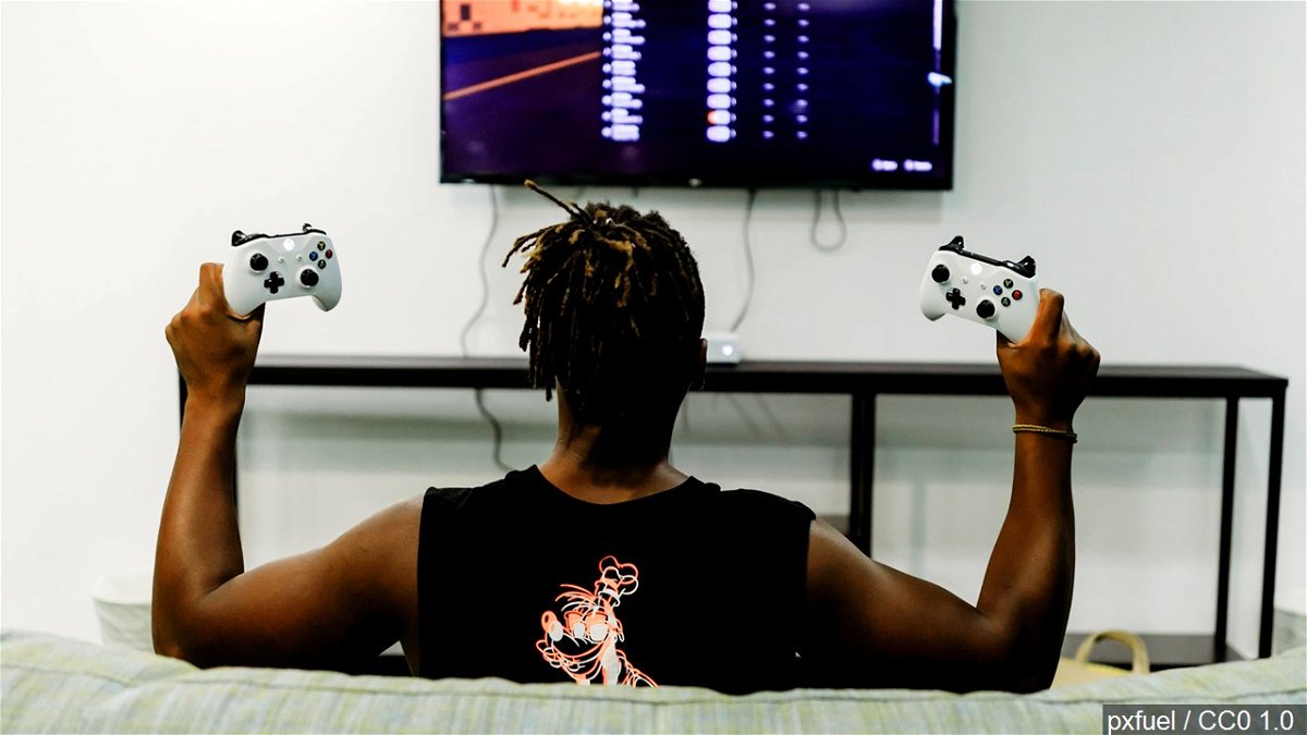 A man plays a video game.